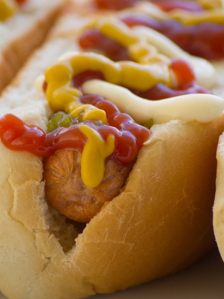 hot dog with ketchup, mustard and relish